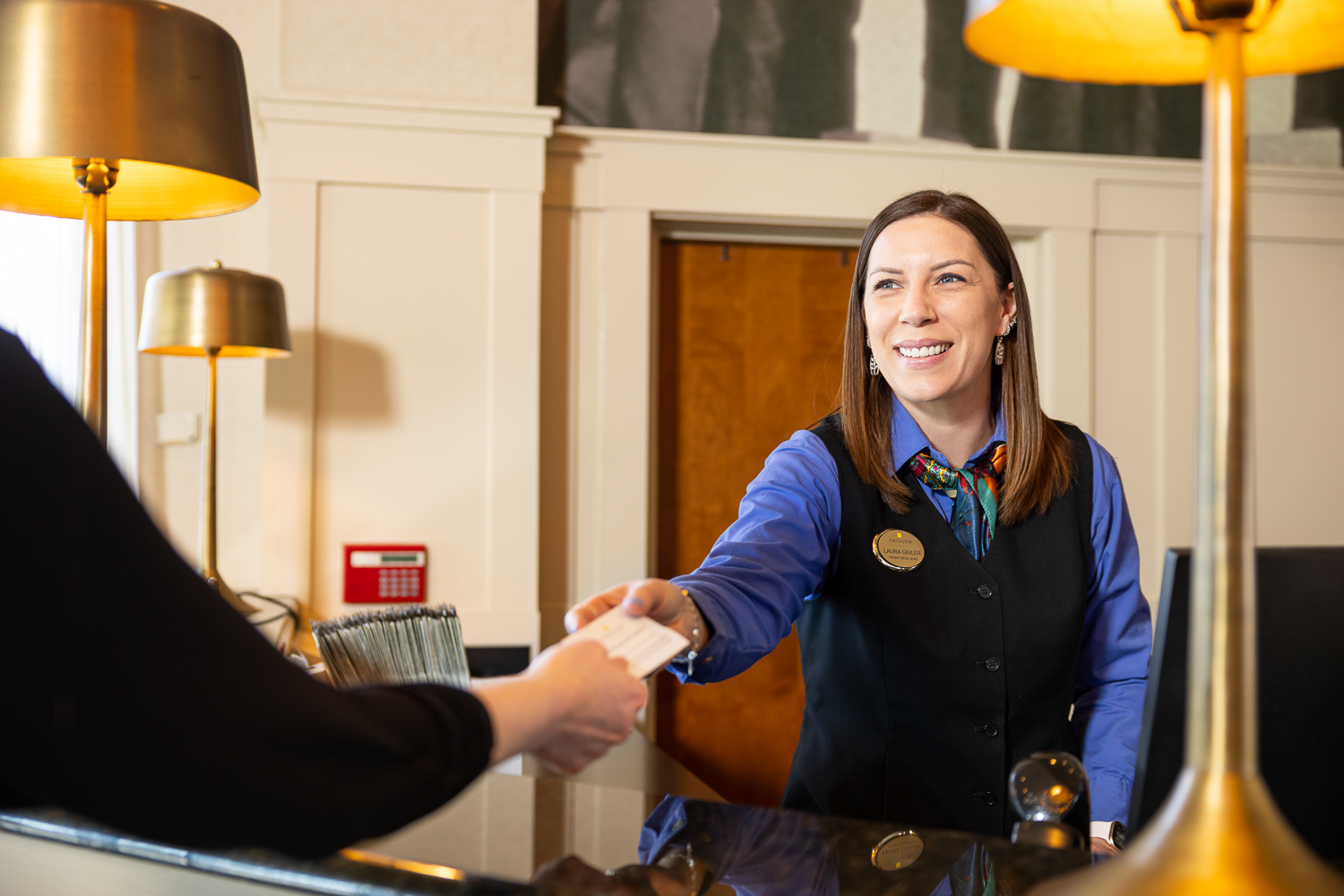 Front desk at AmishView helps a guest
